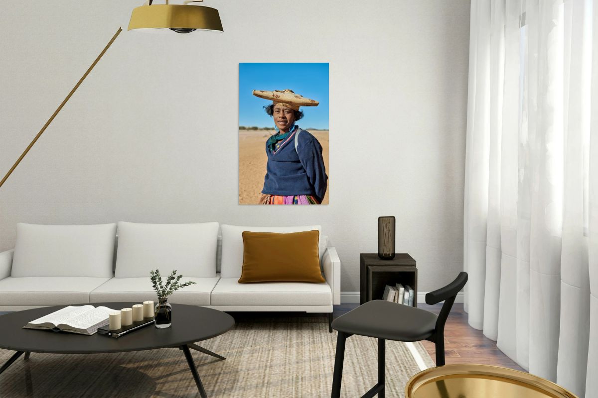 Woman of Herero Bantu ethnic group in Namibias landscape