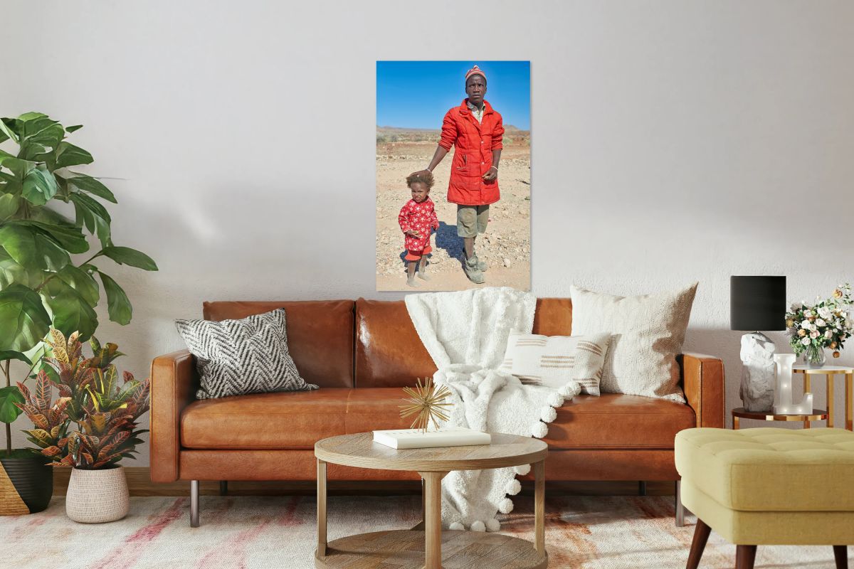 Father and daughter stand together in Palmwag Kunene Region