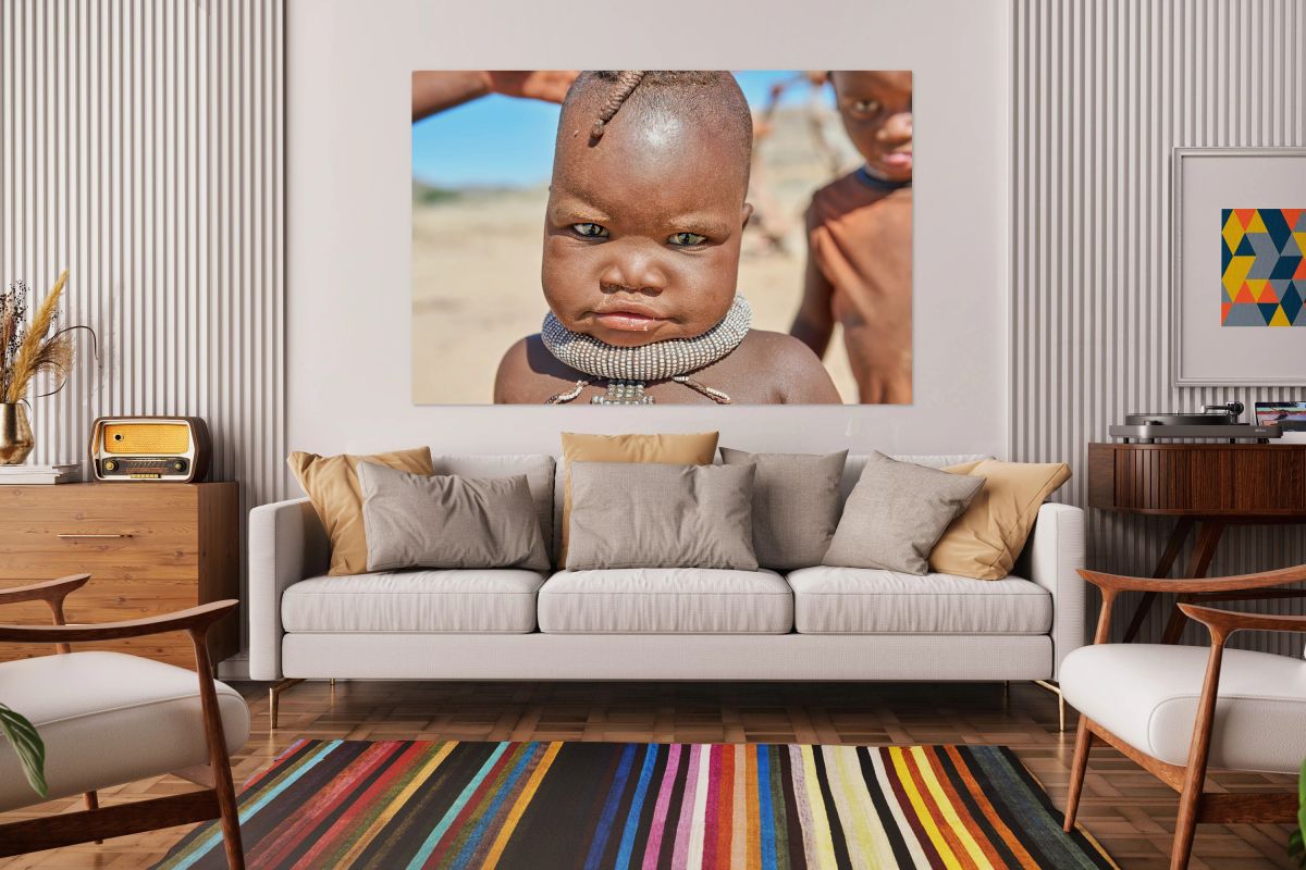 Portrait of Himba child in Kunene region of Namibia