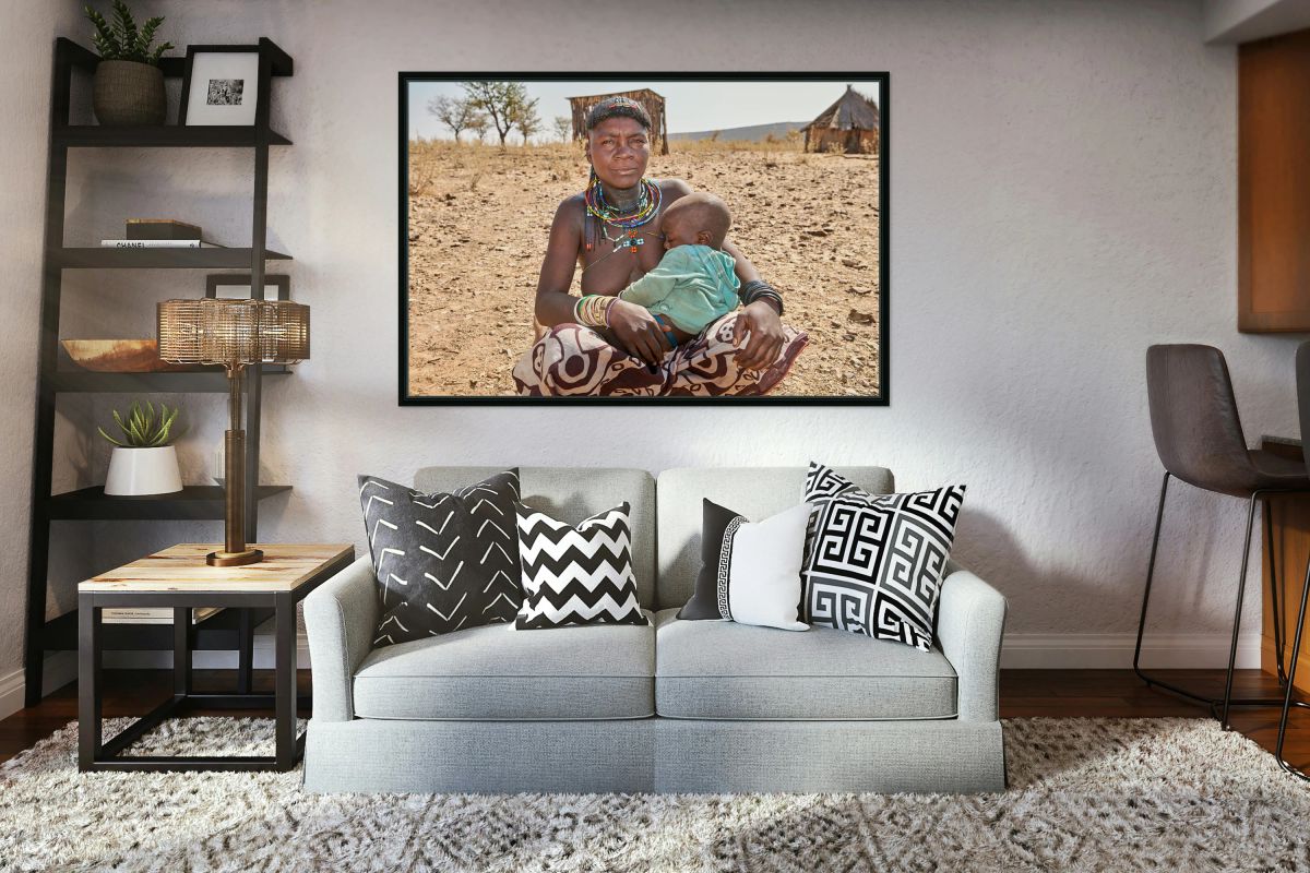 Young woman of Zemba Bantu ethnic group with child in Namibia