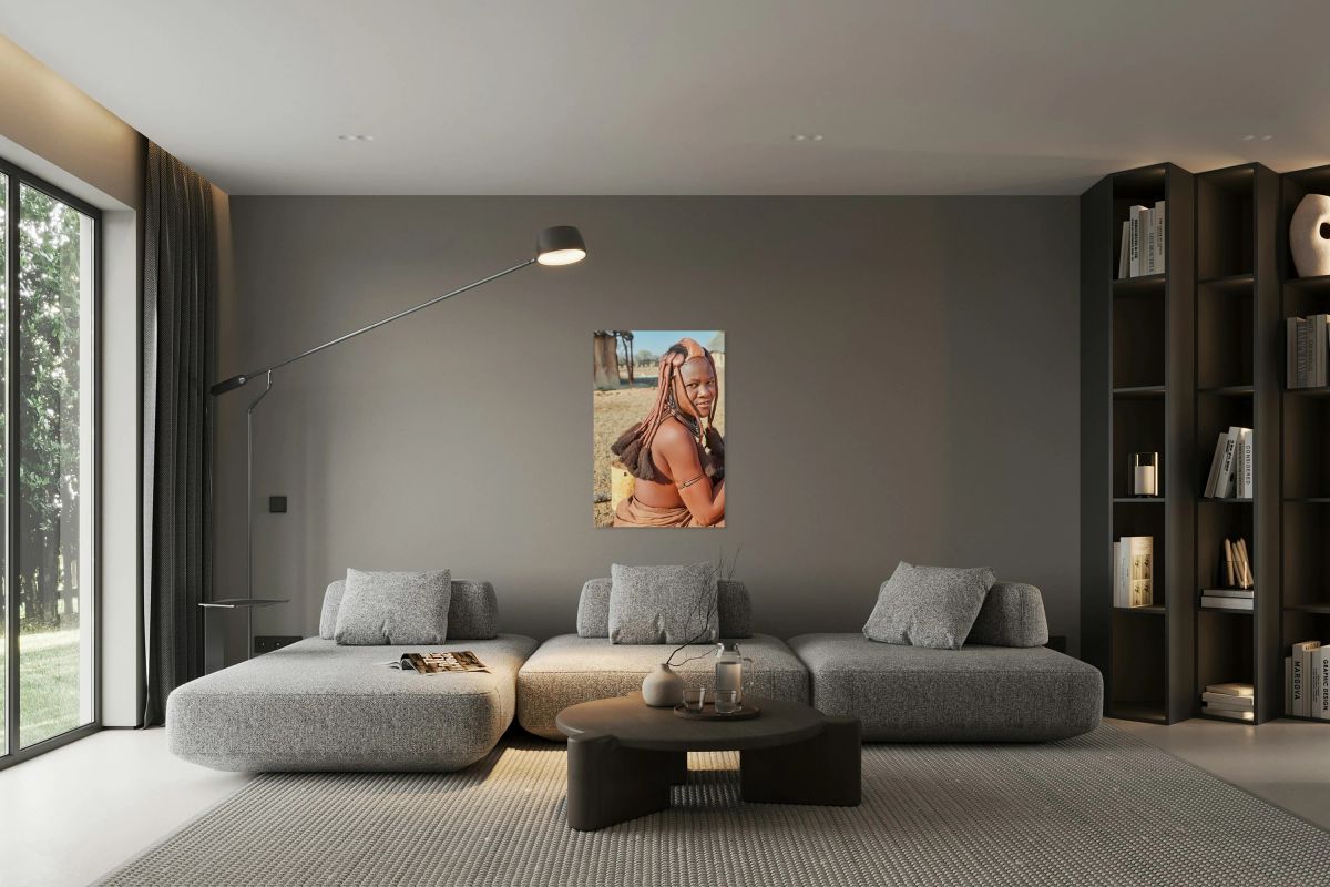 Himba woman in her village wearing traditional hair headdress