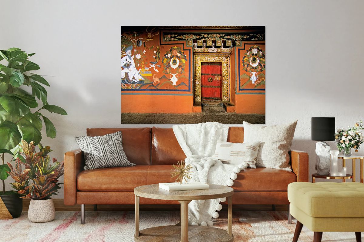 Vibrant wall murals and an ornate red door.