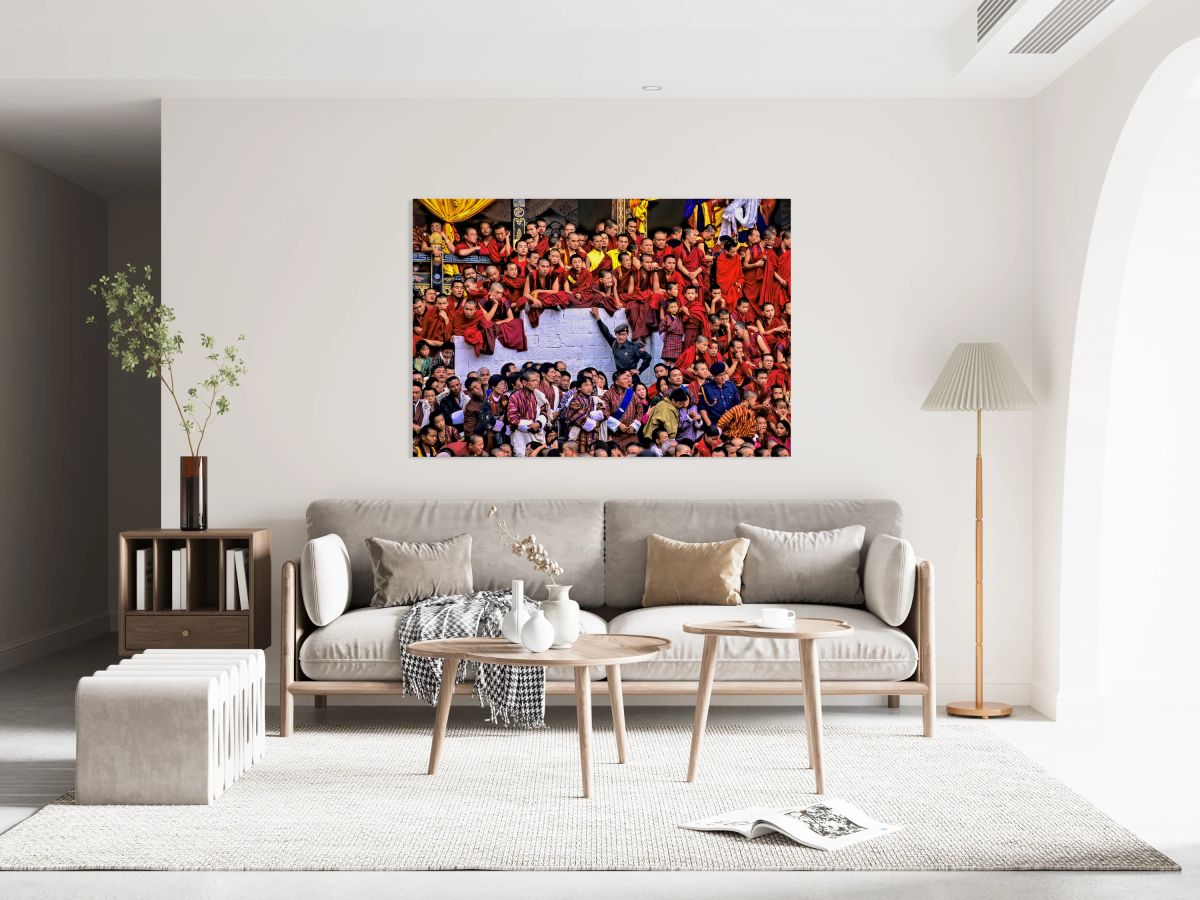Monks and people observe a traditional Bhutanese ceremony.