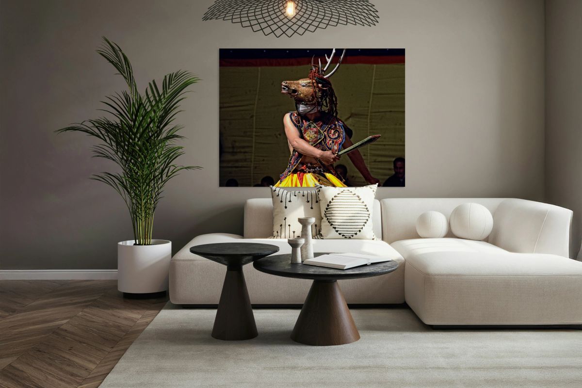 Traditional deer mask dancer with sword.