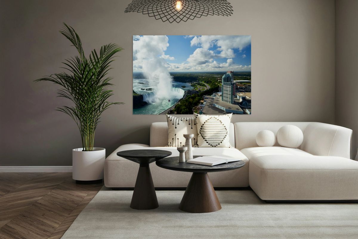 Panoramic view of Niagara Falls and urban landscape.