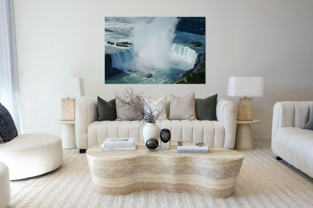 Majestic Niagara Falls a boat braves the mist.