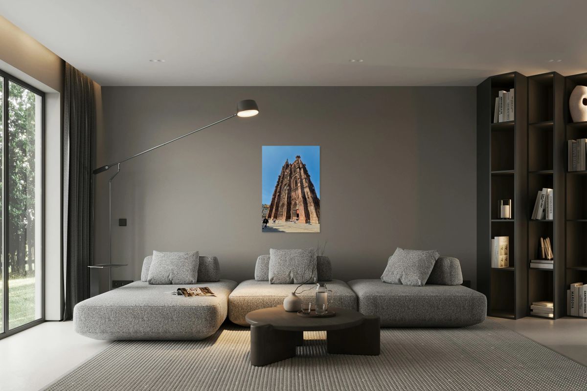 Strasbourg Cathedral stands tall in Alsace square on a sunny day