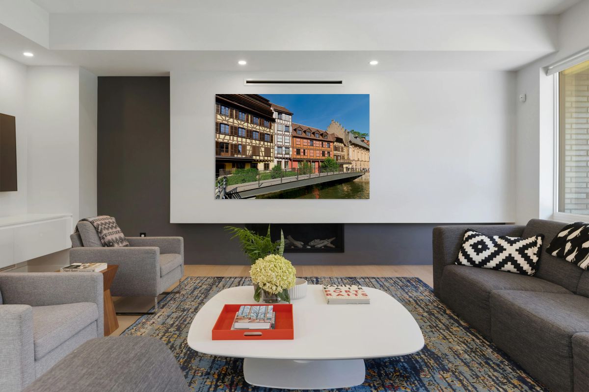 Visitors enjoy Petit France in Strasbourg with timber framed hou