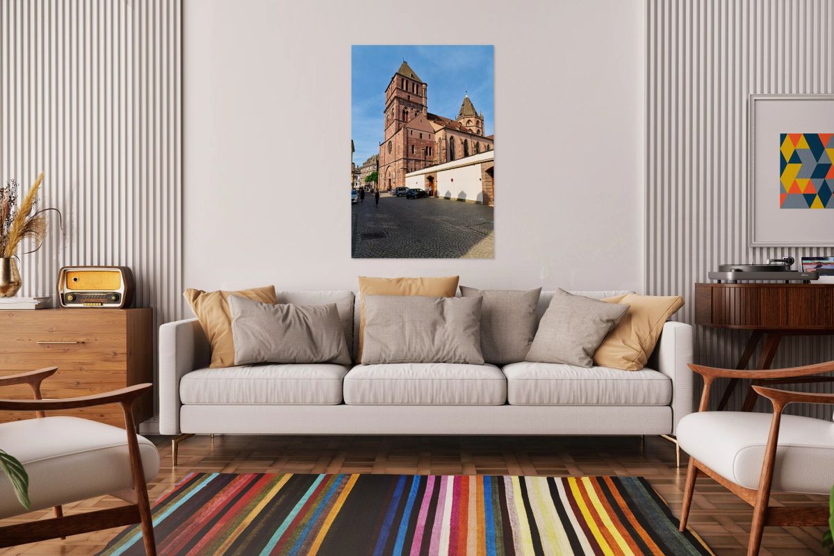 Saint Thomas church in Strasbourg with people walking nearby