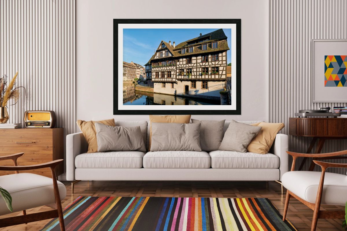 Wooden houses line the canal in Petit France district