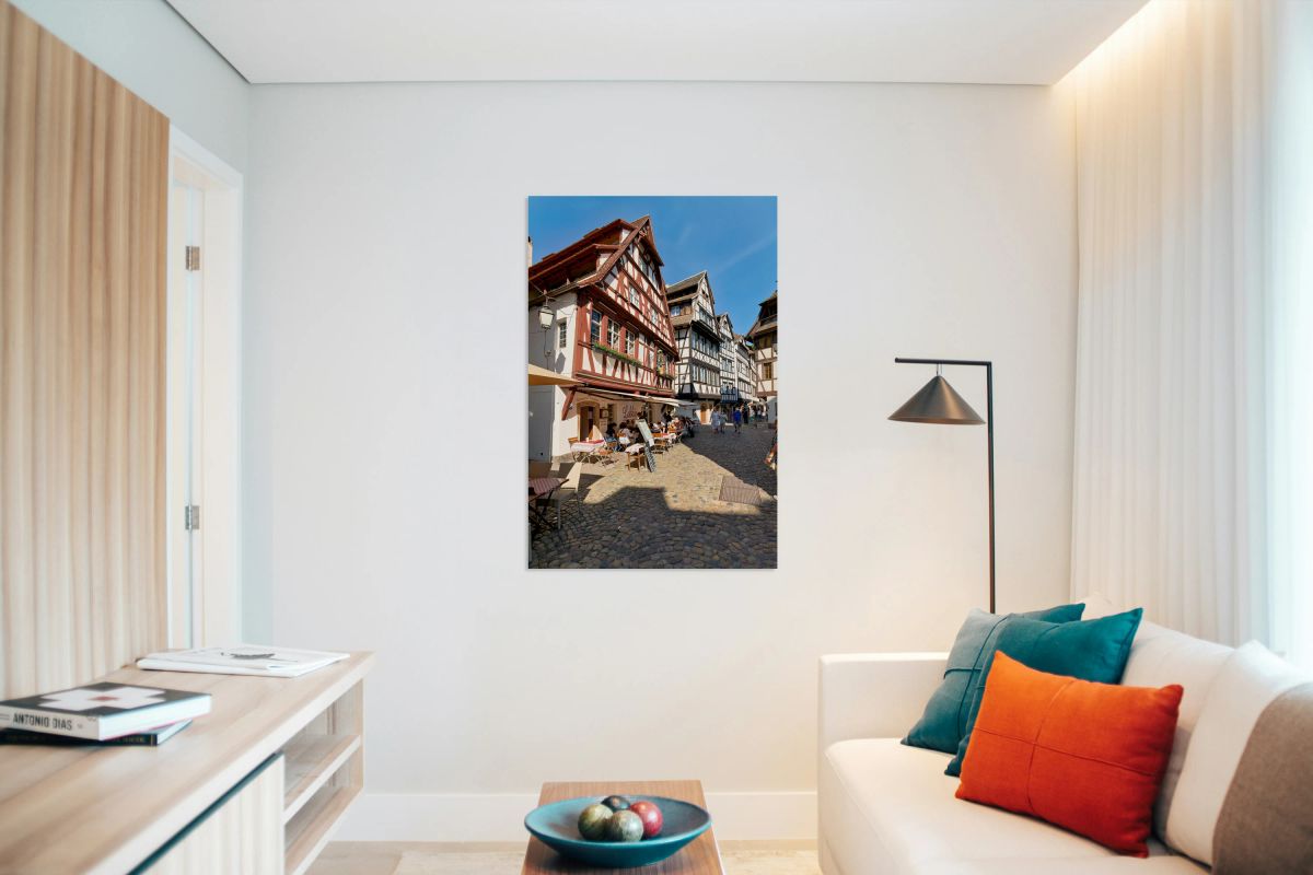 Colorful timber houses in Petit France with food loving visitors