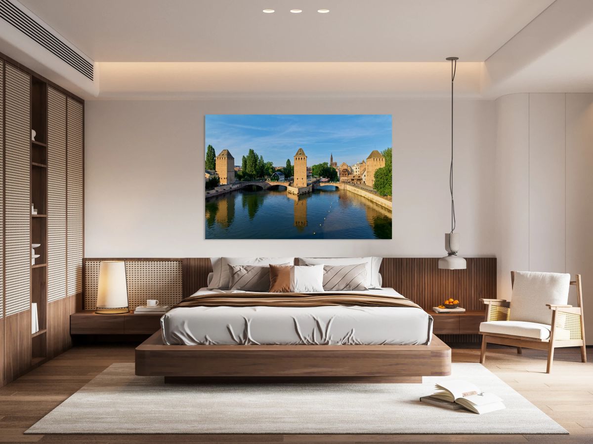 Covered bridges connect towers over water in Strasbourg Alsace