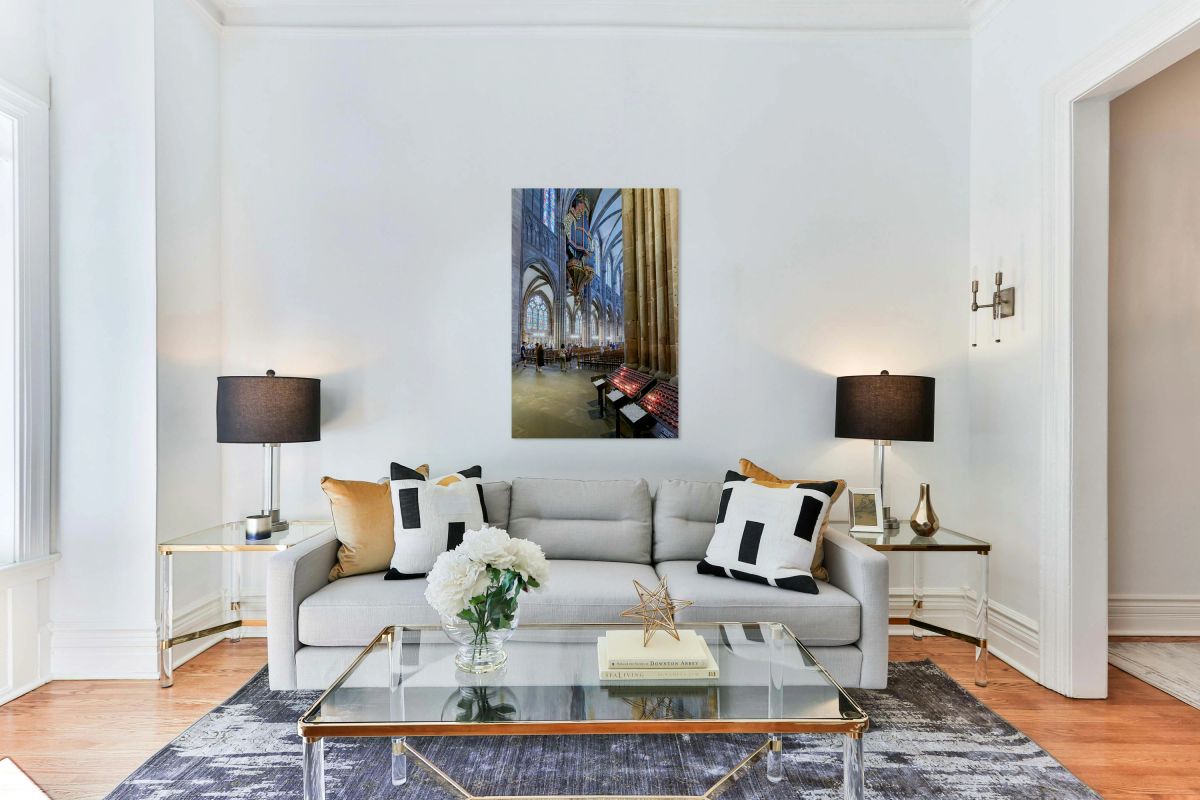 Visitors explore Strasbourg Cathedral with the grand organ pipe