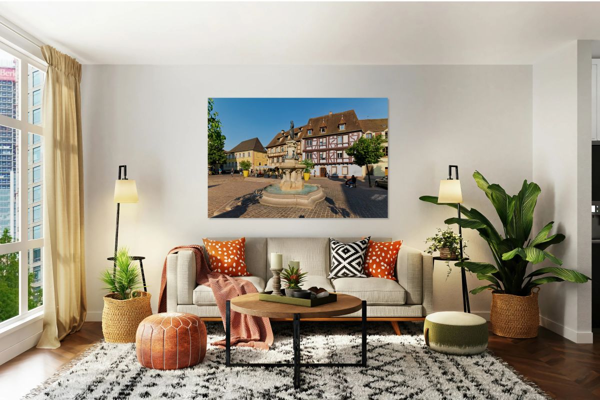 Visitors enjoy warm day at fountain in Petite Venise Colmar