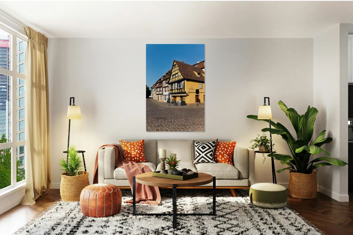 Visitors walk in Petite Venise while exploring timber framed hou