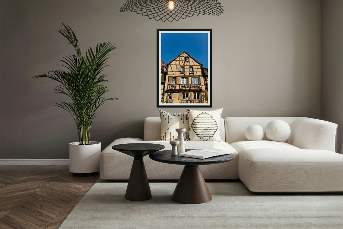 Timber framed houses in Colmar with clear blue sky above