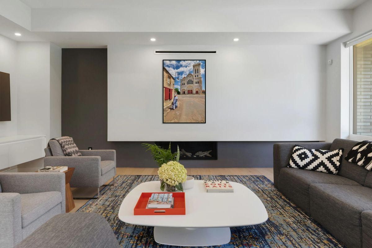 Nun walks by Vezelay Abbey in Bourgogne France during the day
