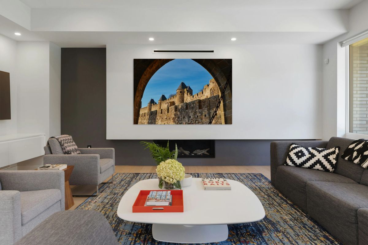 Exploring the historic walls of Carcassonne in France under blue