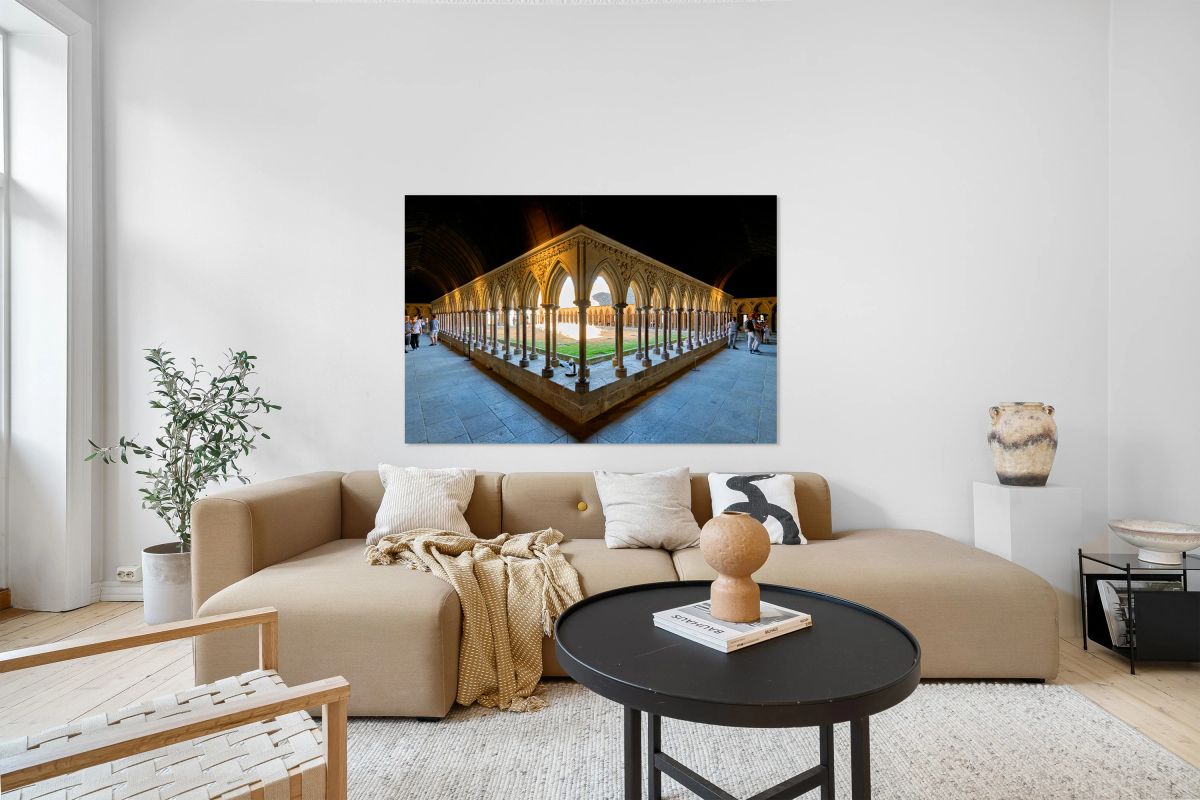 Exploring the cloister at Mont Saint Michel abbey in Normandy Fr