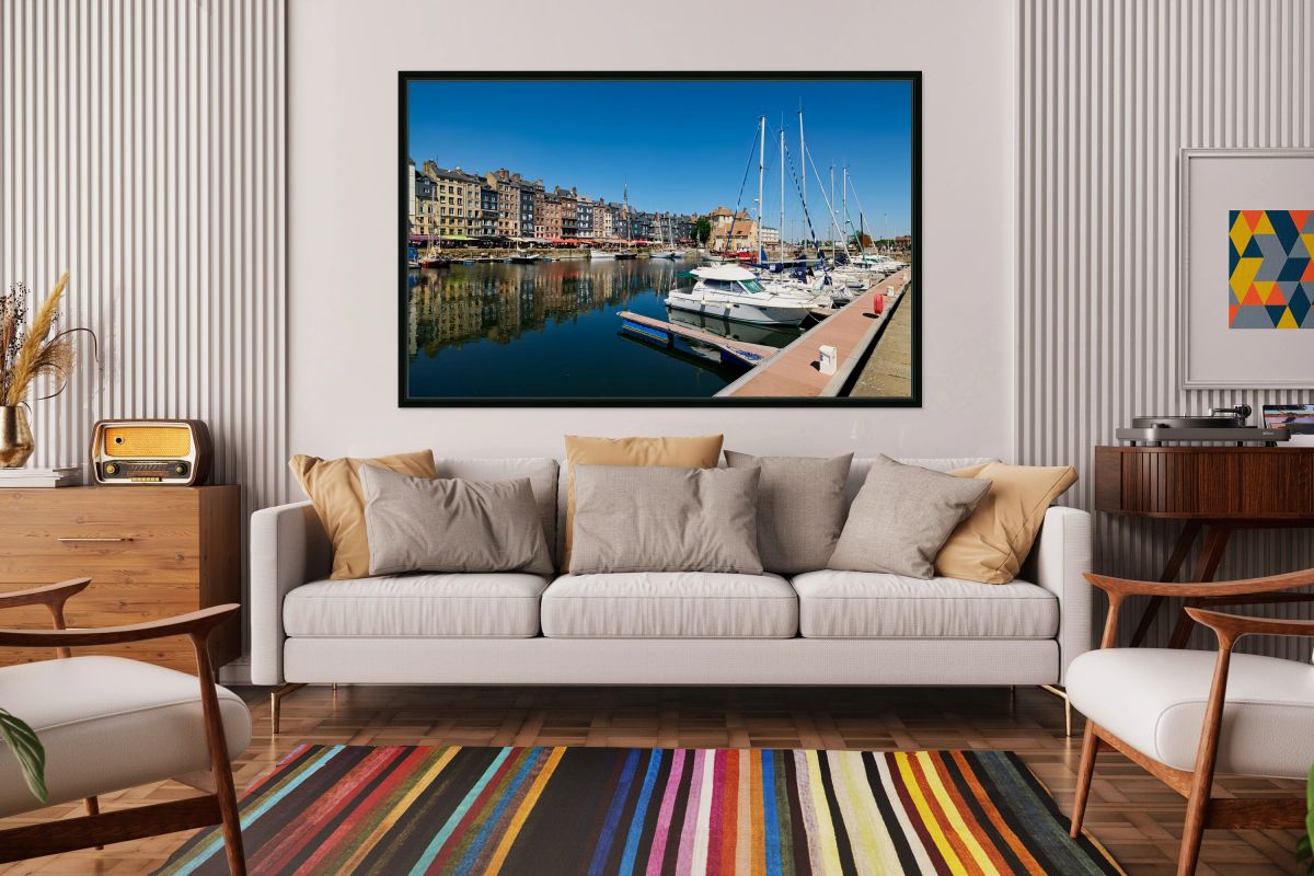 Boats docked at Honfleur harbor in Normandy France during a sunn