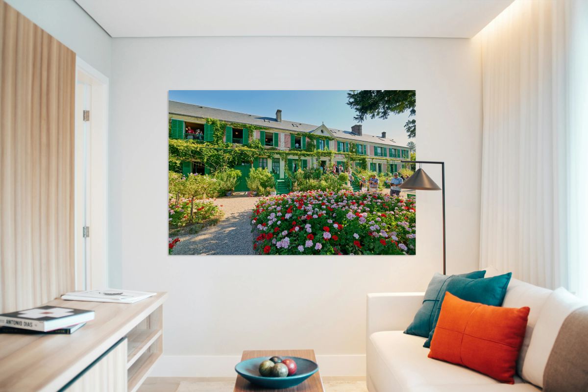 Visitors admire Monets house and garden in Giverny Normandy Fra