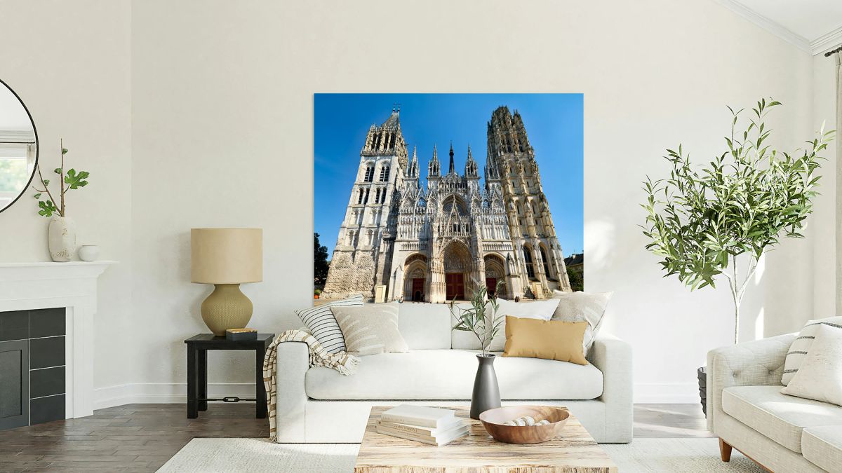 Notre Dame Cathedral stands tall in Rouen Normandy under clear s