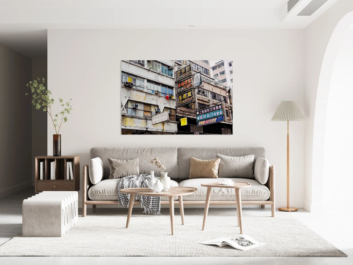 Weathered city buildings in Hong Kong with Chinese signs and lau