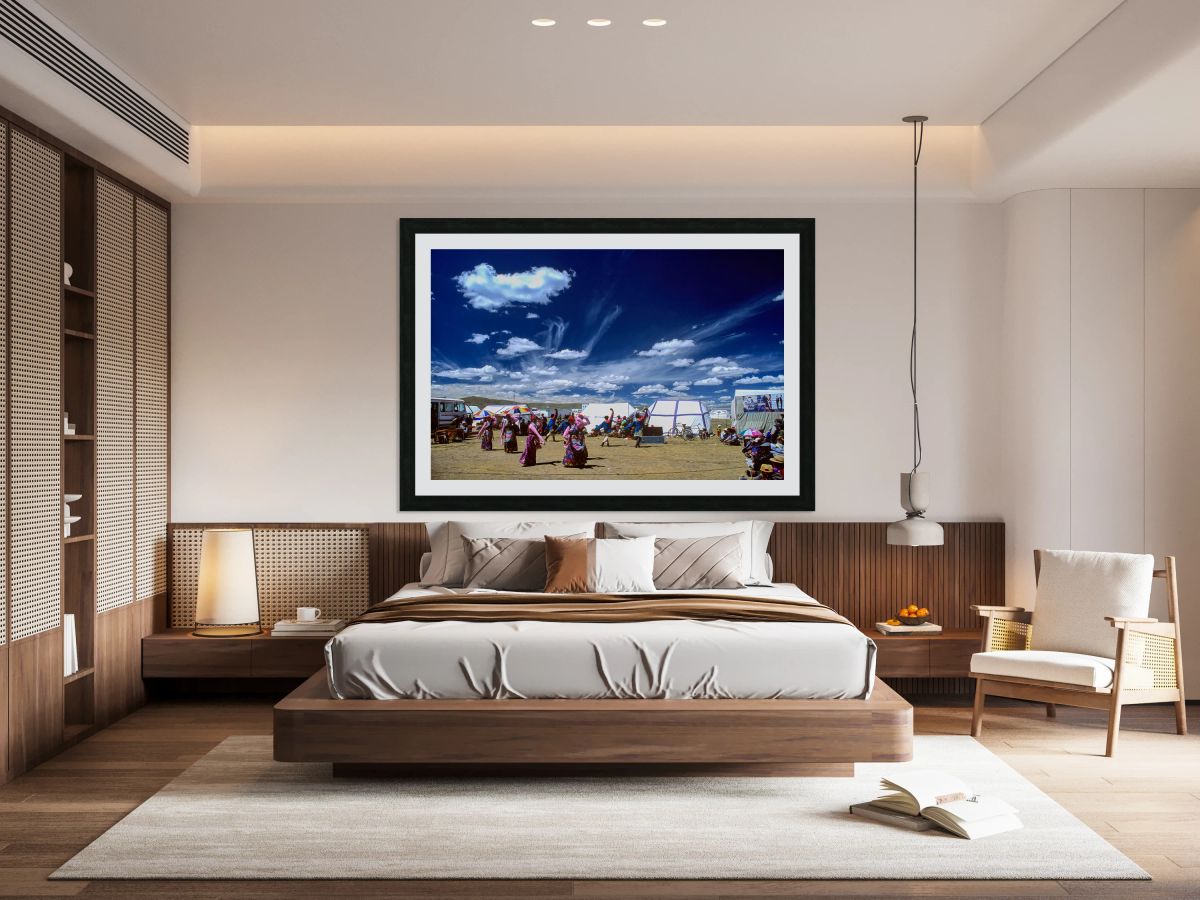 Outdoor festival in Tibet with traditional dancing and tents