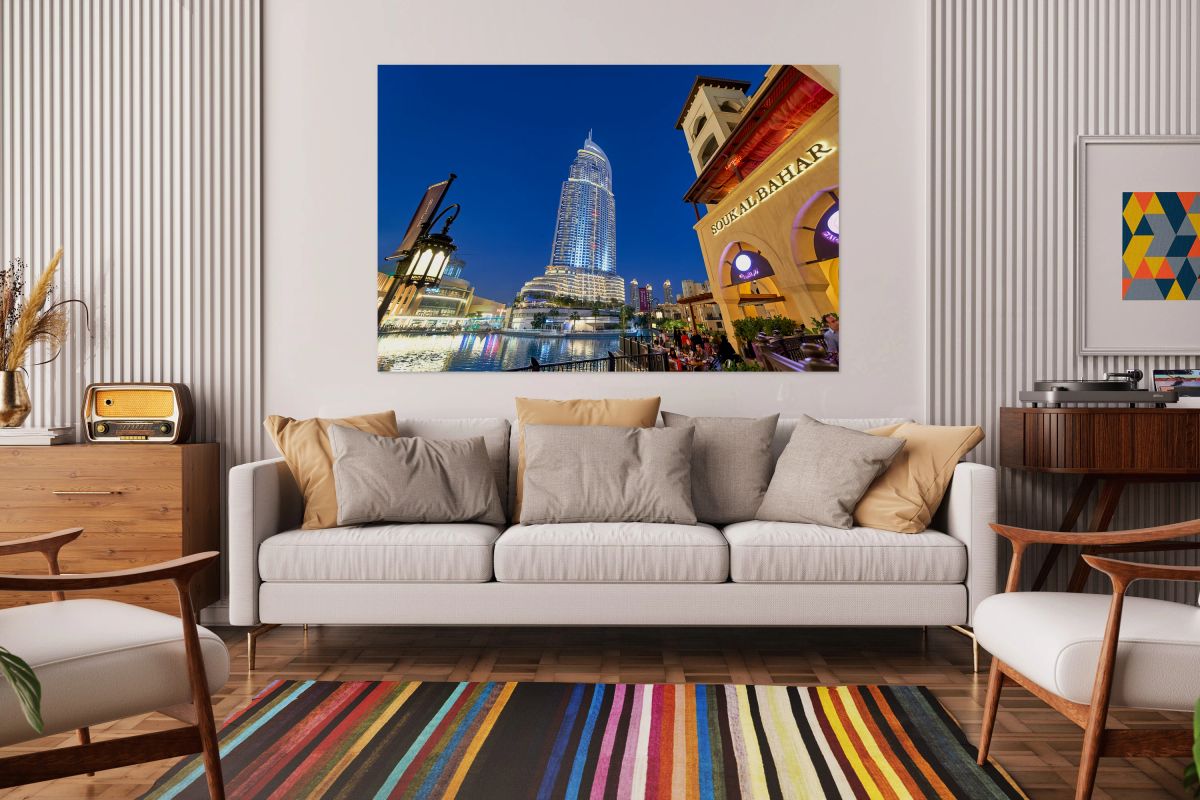 Night lights and waterfront dining in Dubai cityscape