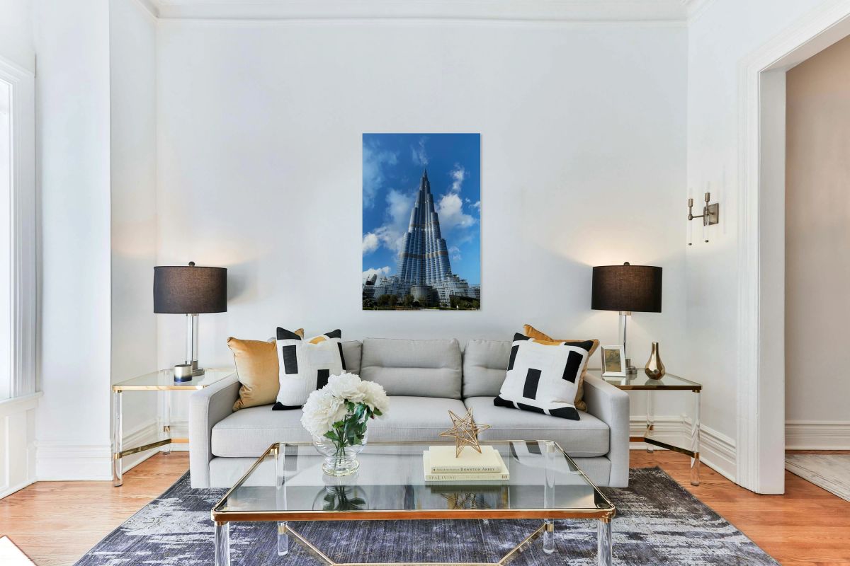 Burj Khalifa stands tall against a blue sky in Dubai UAE