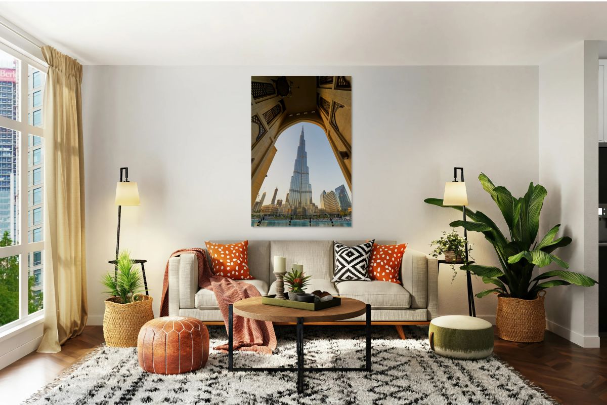 Burj Khalifa seen through ornate arch in Dubai cityscape