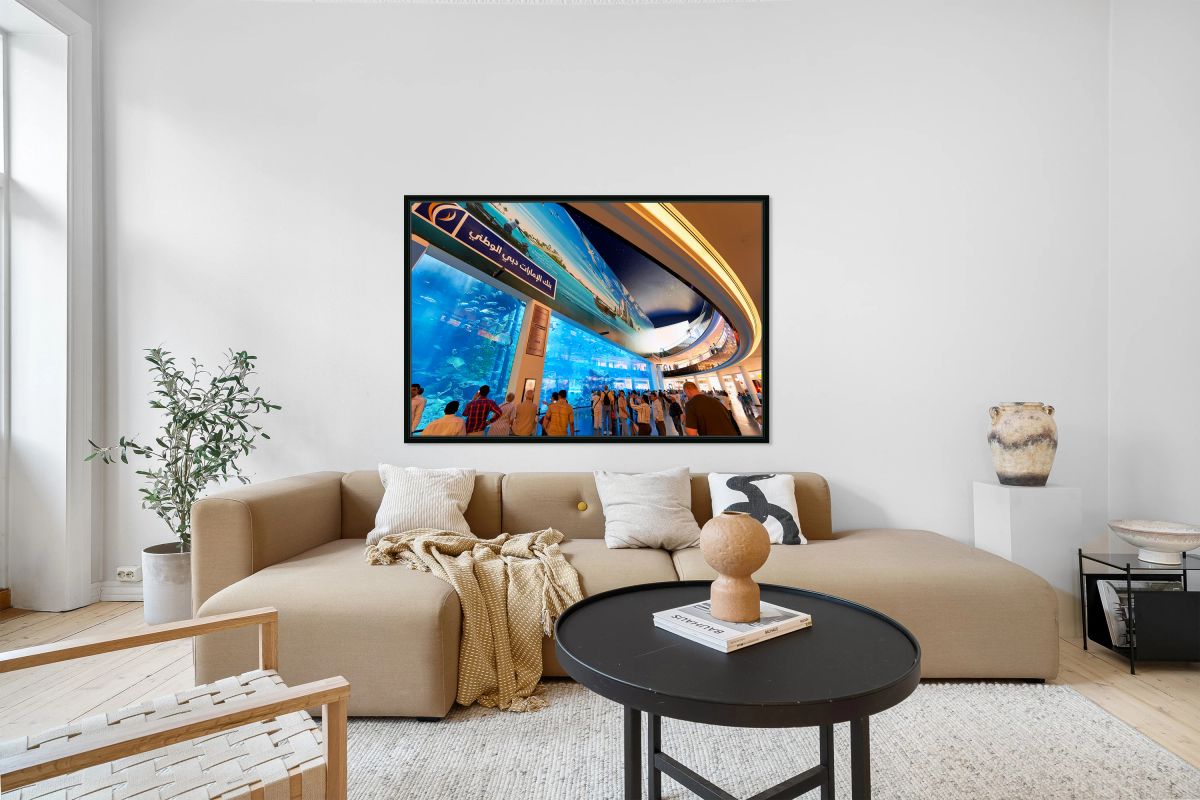 Visitors enjoy giant aquarium and screen in Dubai mall