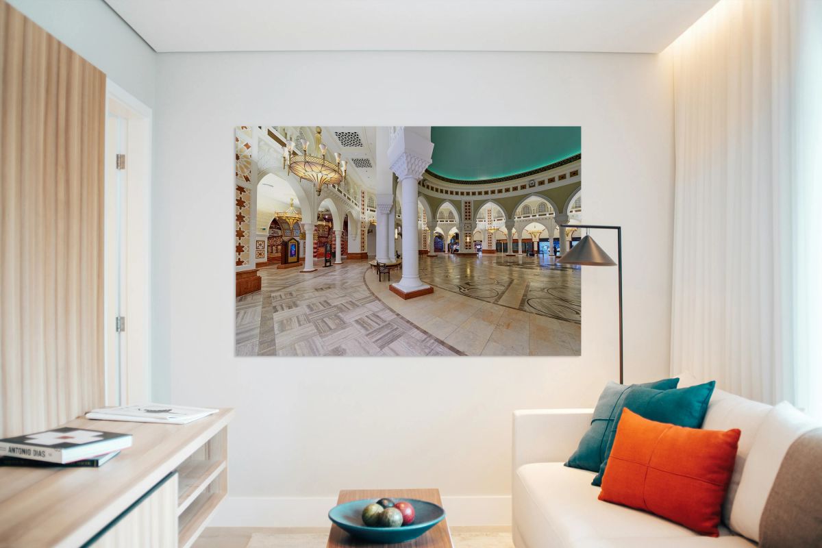 Ornate Middle Eastern interior with arches and chandeliers in Du