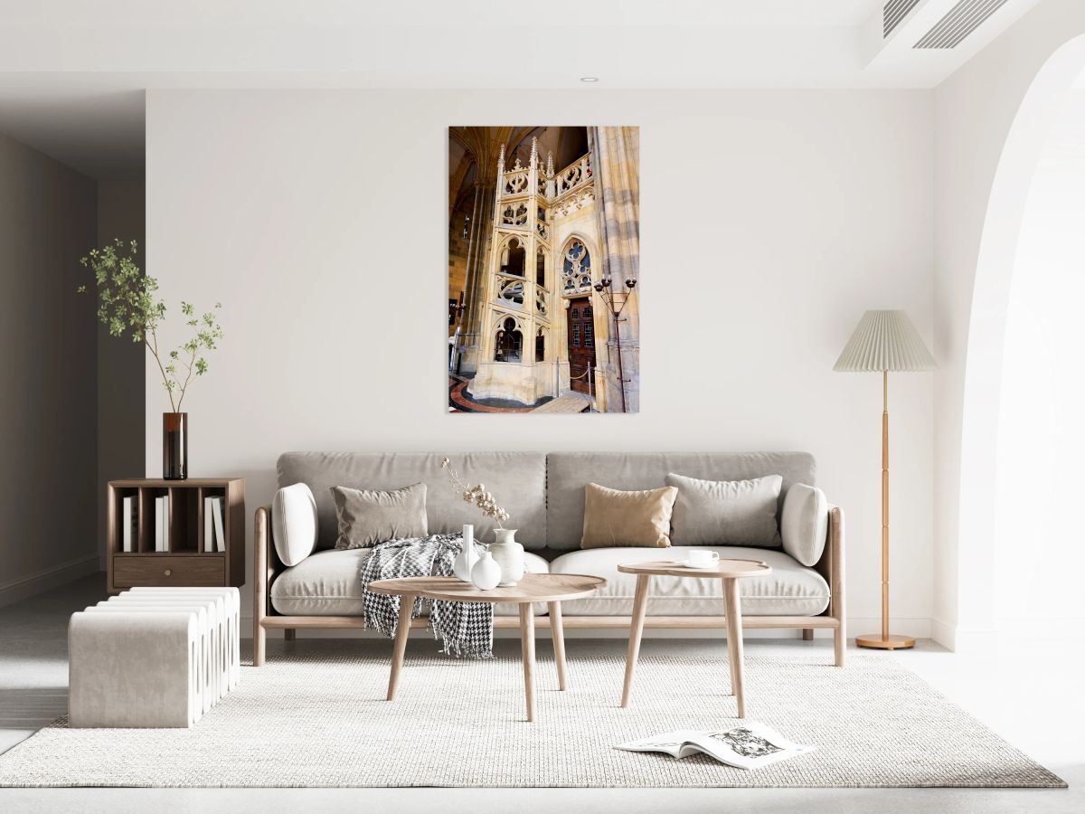 Ornate Gothic stone structure and door inside a cathedral.