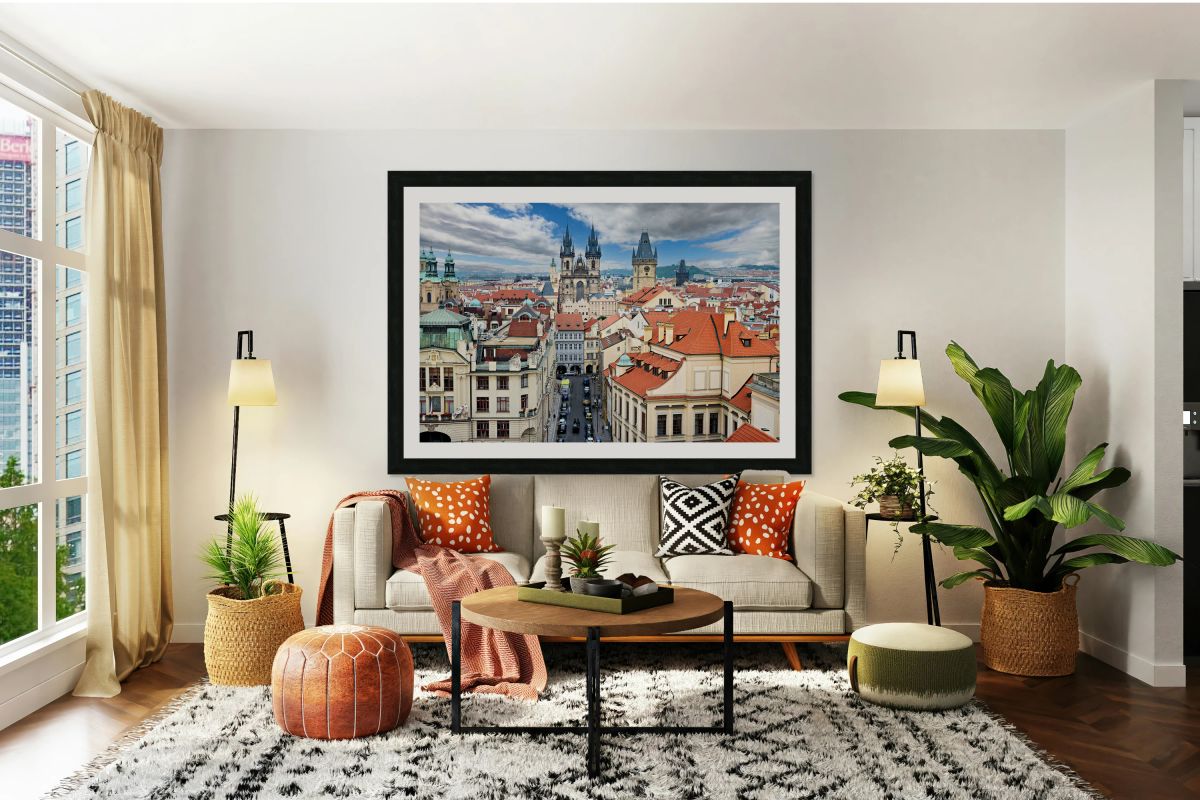 Pragues historic cityscape: spires red roofs and bustling str