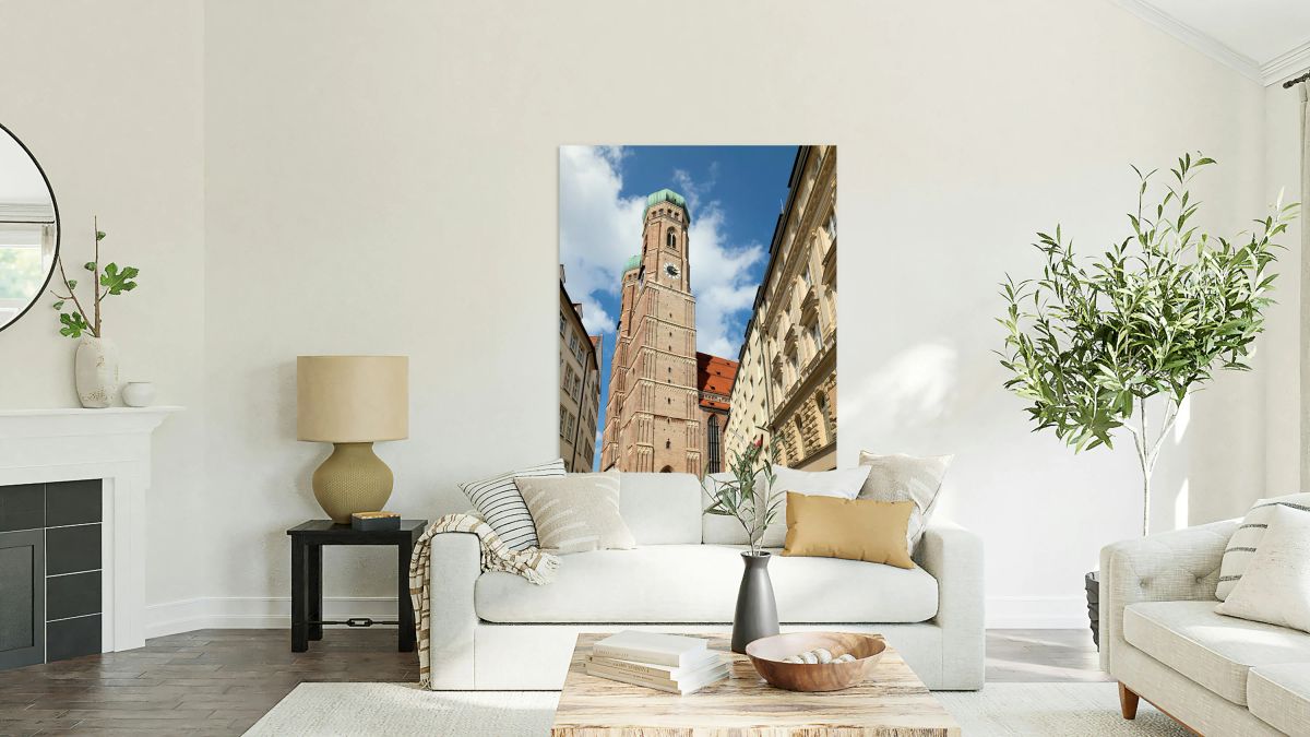 Visitors at Frauenkirche in Munich under a clear sky