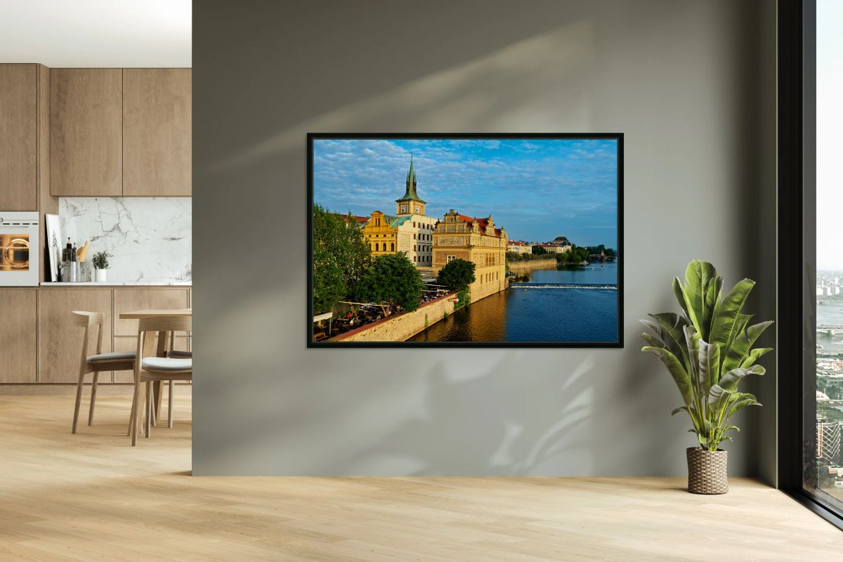 Pragues Vltava riverfront with historic architecture and lively