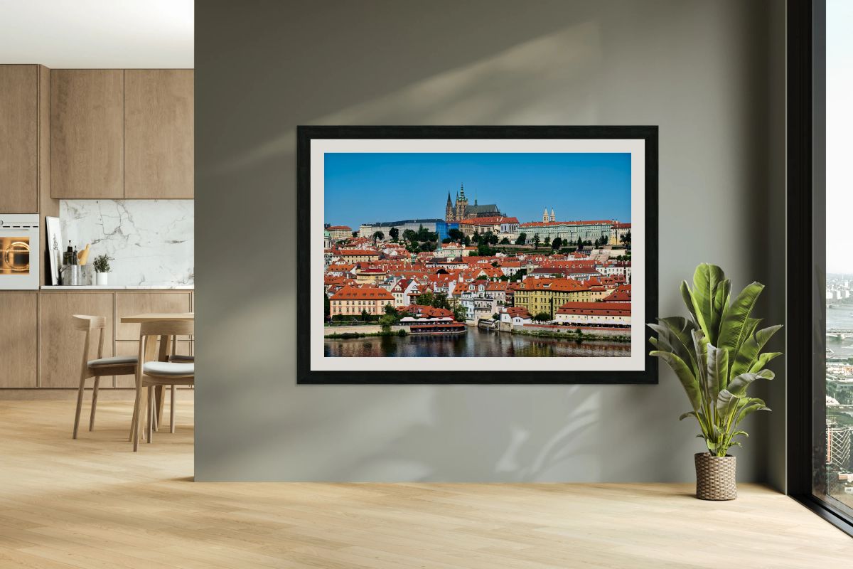 Prague Castle and city skyline over Vltava River.