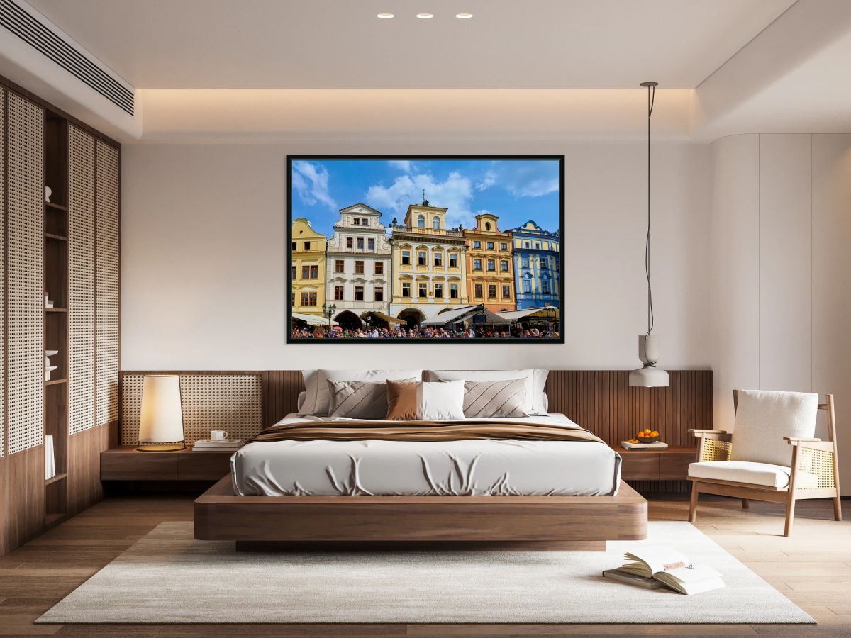 Colorful historic buildings and a lively crowd in a European squ