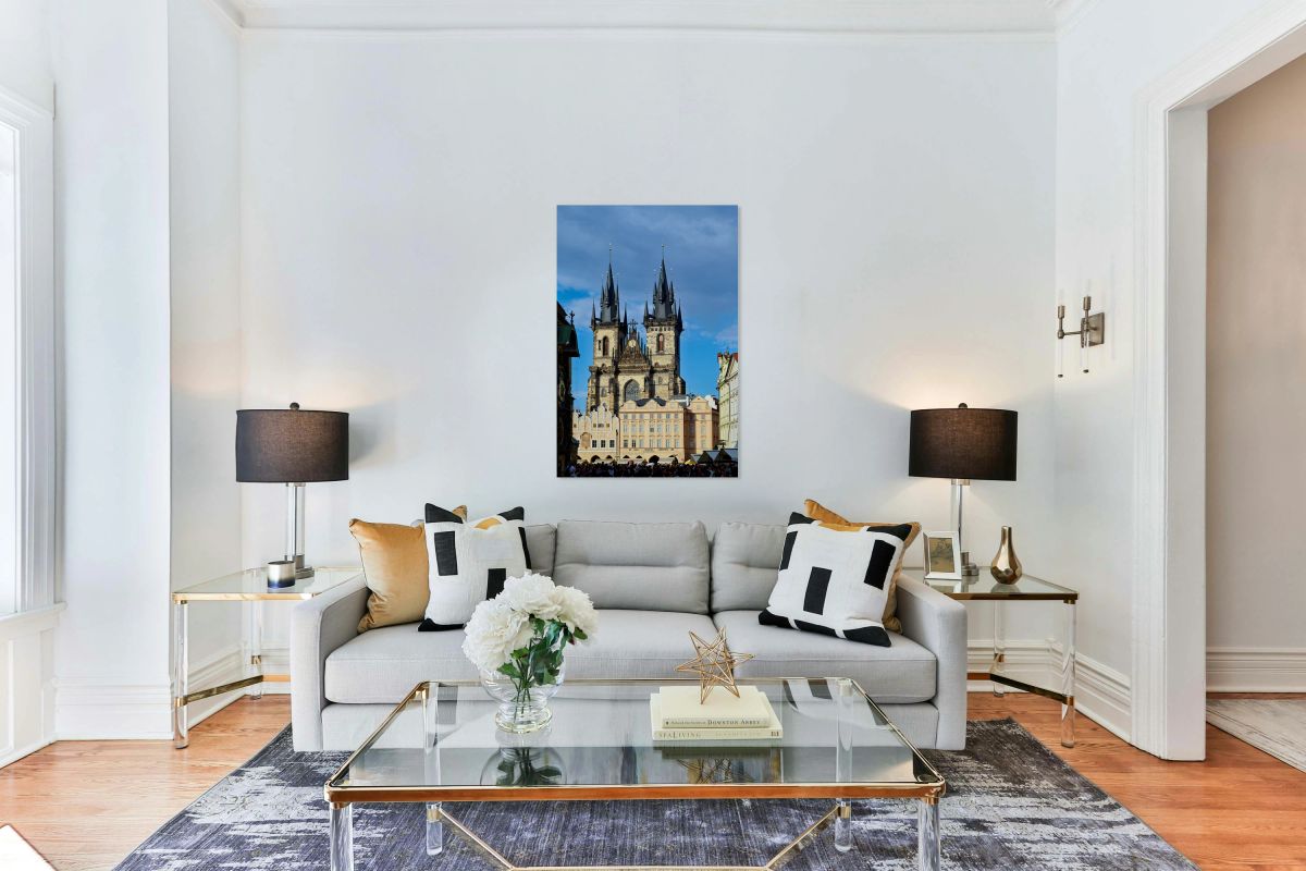 Pragues Týn Church towers over Old Town Square crowd.