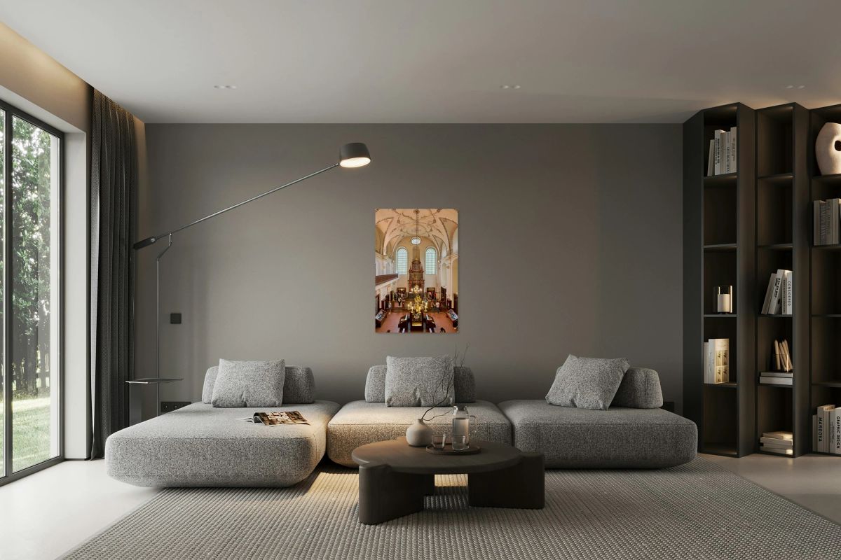 Ornate synagogue interior with tourists chandelier and stained