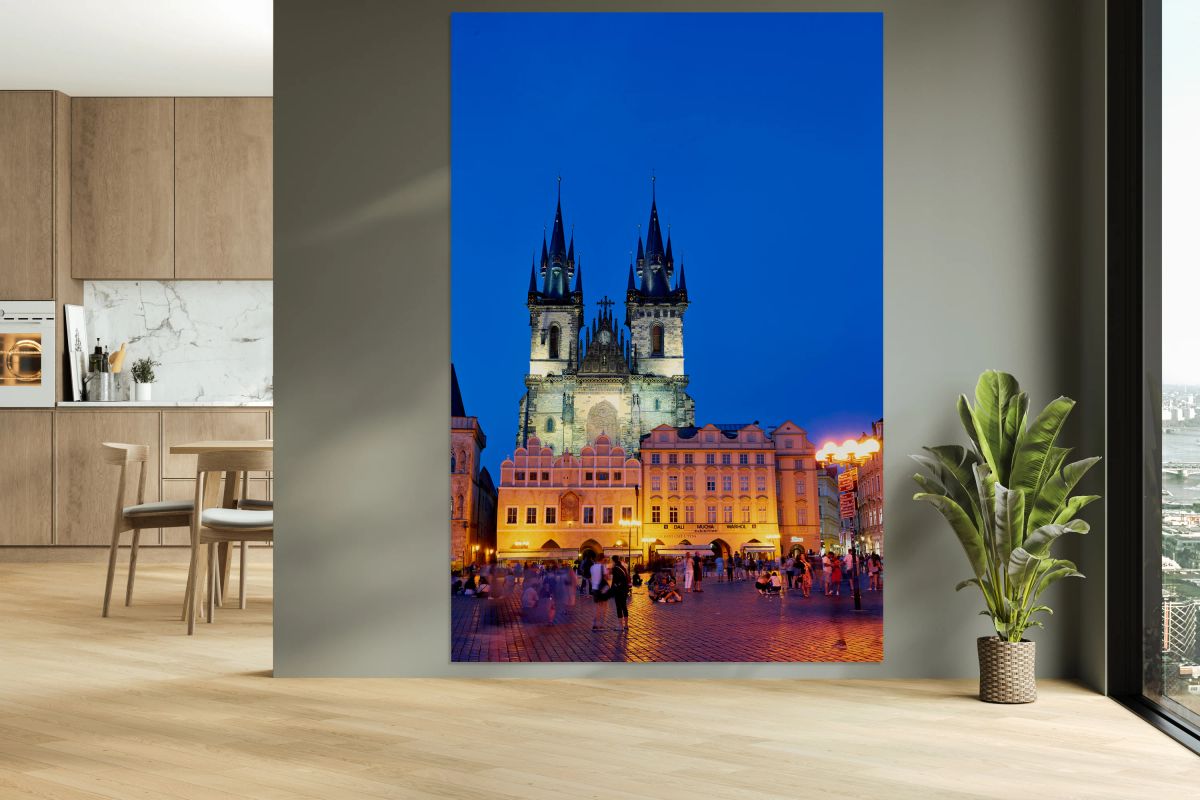 Pragues Tyn Church and Old Town Square at night.