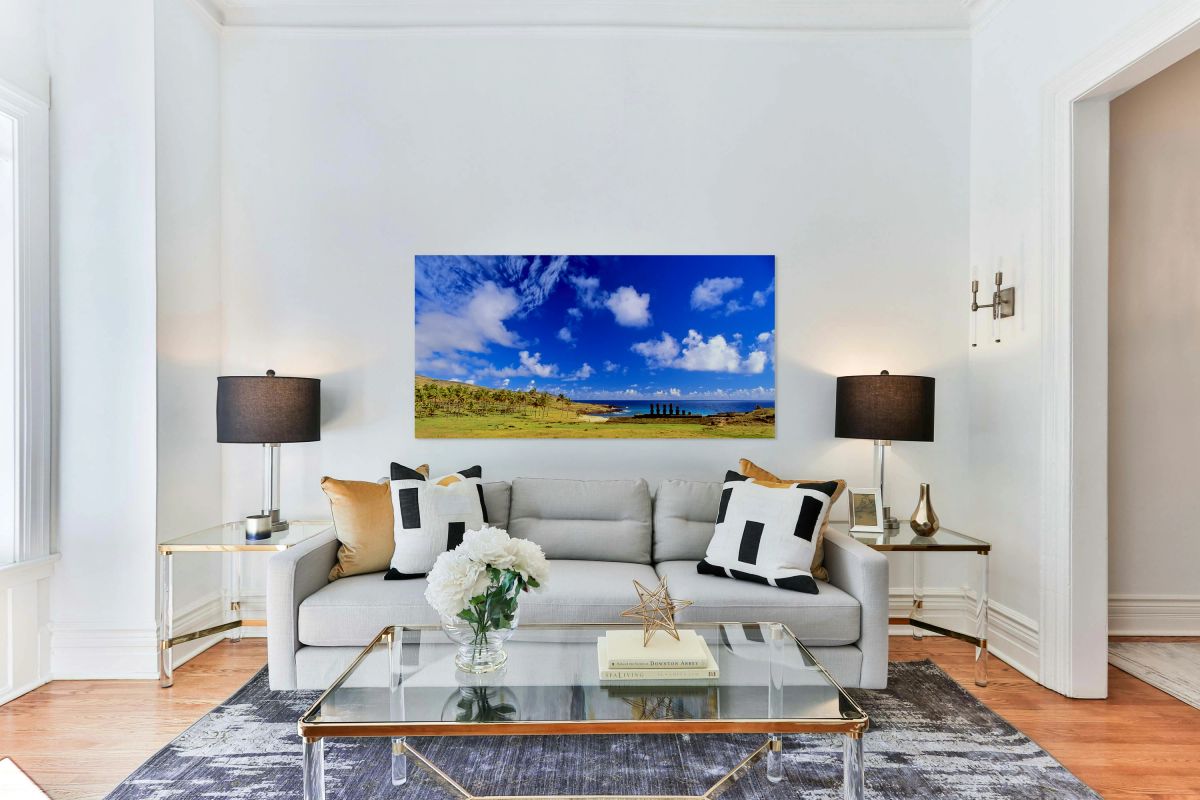 Moai statues palm trees and beach on Easter Island.