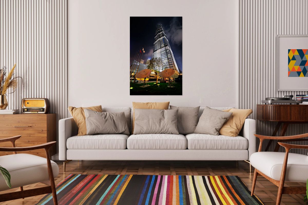 Modern skyscraper with satellite dishes at night in Shanghai Chi