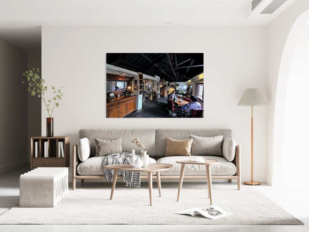 Customers enjoy drinks and food in a vintage cafe in Shanghai