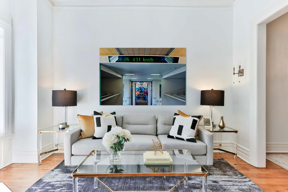 High speed train interior showing speed readout in Shanghai