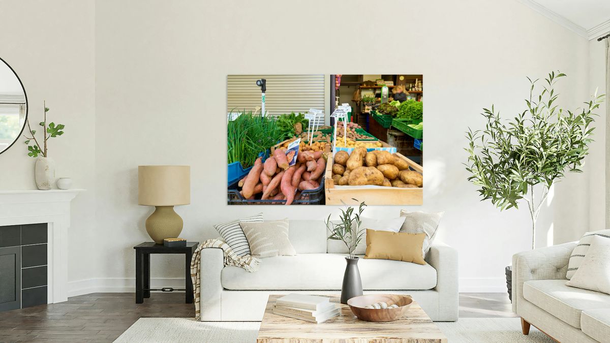 Greengrocer selling varieties of potatoes in Augsburg Bavaria