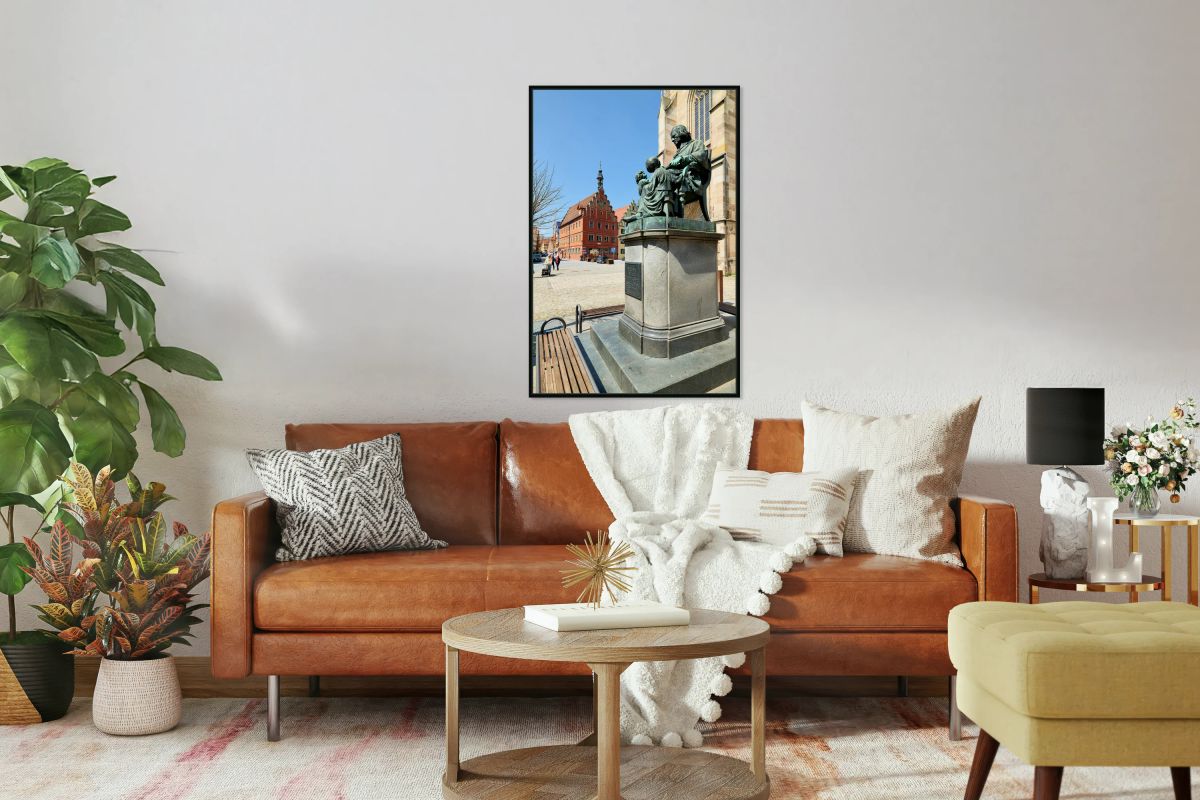 Visitors explore Dinkelsbuhl old town and historical statue