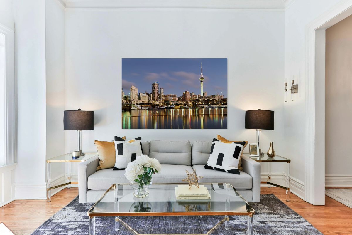 Auckland skyline with buildings and Sky Tower during evening