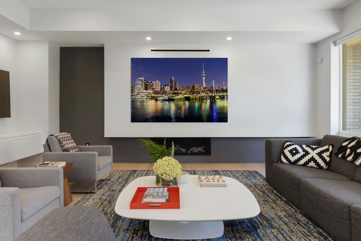 View of Auckland skyline from Viaduct Harbour at sunset